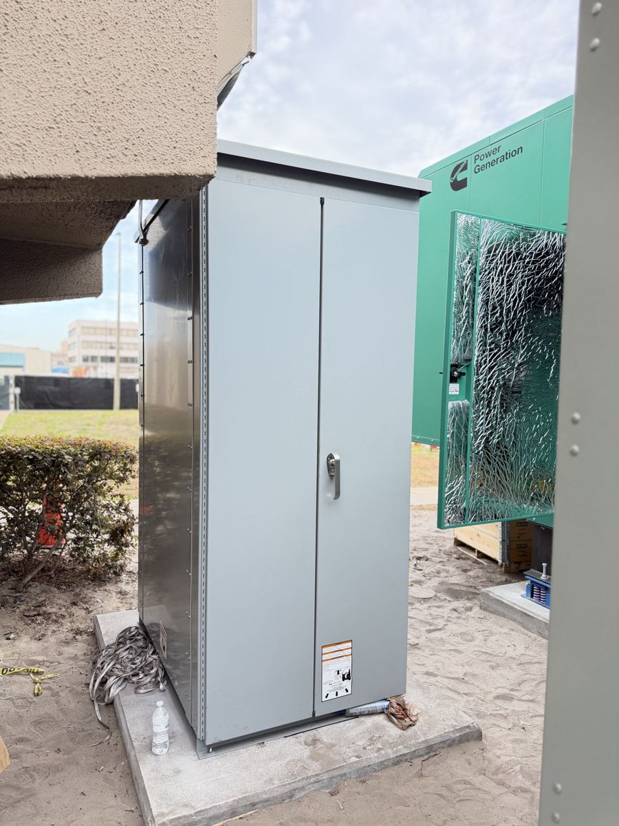 Electrical enclosure next to the generator